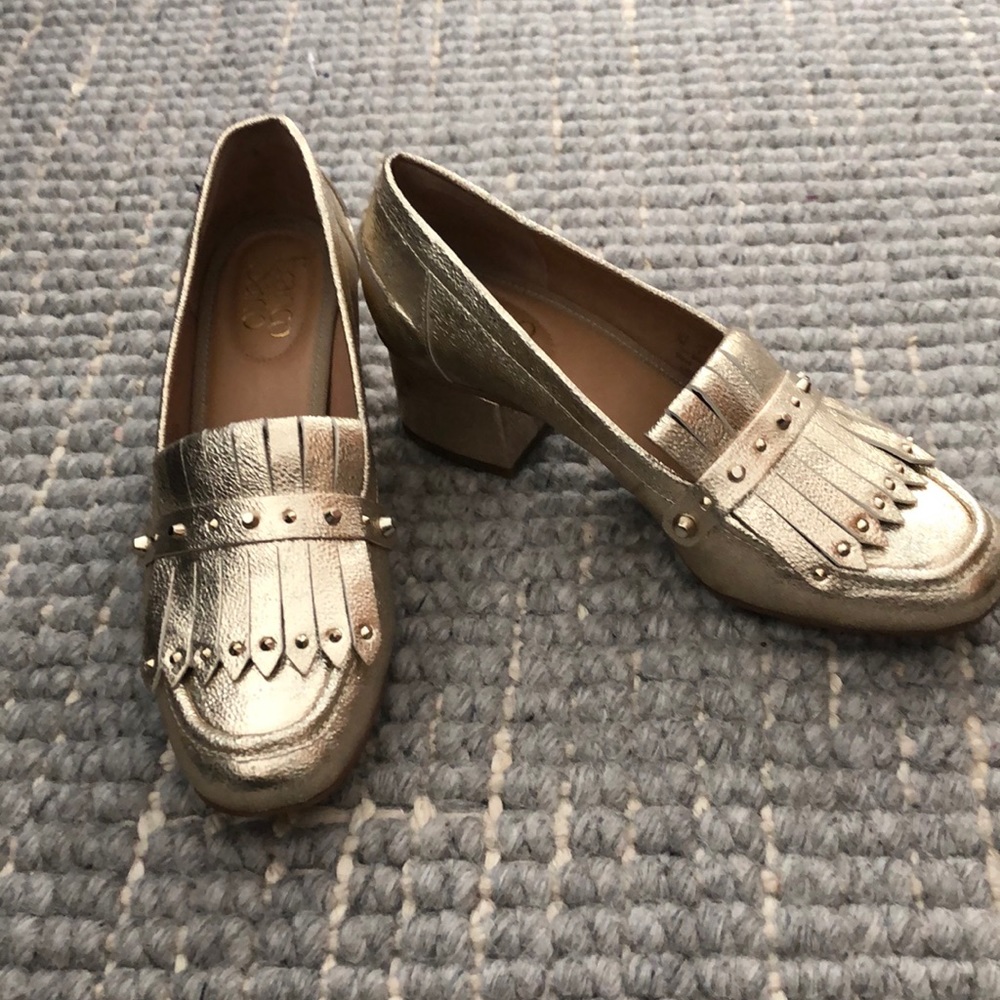 Gold chunky heeled loafer with stud detail. Sz 7